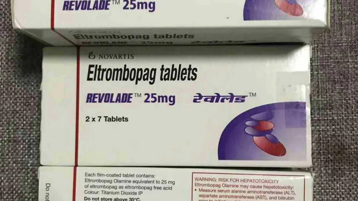 患者在医院医保办窗口咨询艾曲波帕25mg报销政策